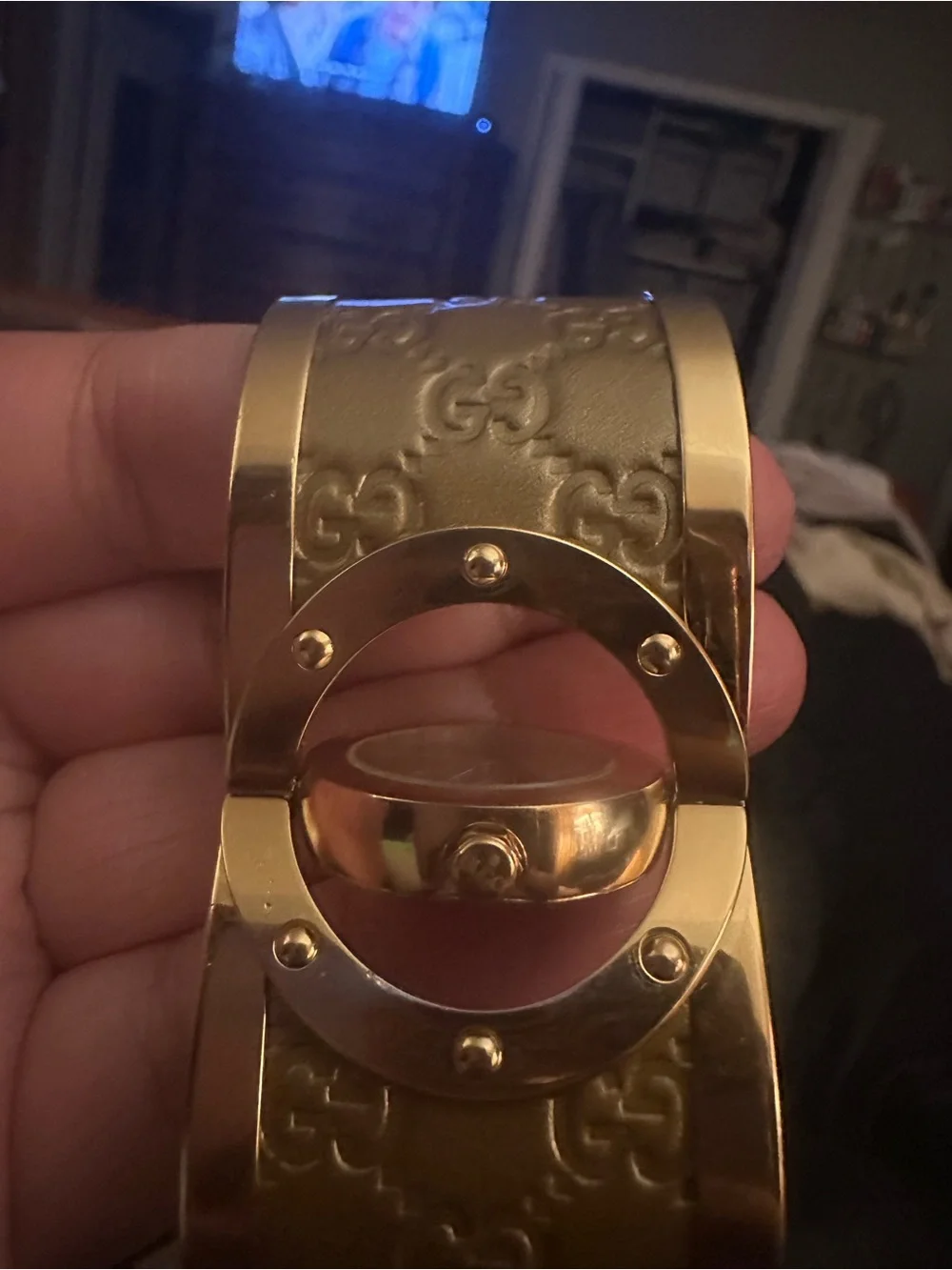 Gucci Gold-Tone Embossed Leather Bangle Watch